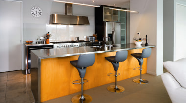 A veiw of this kitchen featuring stainless steel countertop, furniture, interior design, kitchen, product design, real estate, room, table, gray, brown