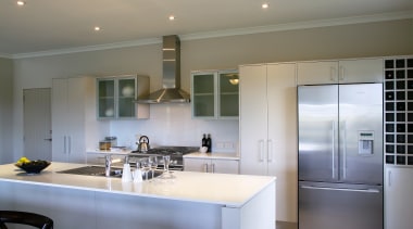 A view of some kitchen appliances from Fisher architecture, cabinetry, countertop, cuisine classique, interior design, kitchen, real estate, room, gray