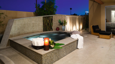 A view of this architecturallly designed pool by backyard, estate, floor, interior design, lighting, property, real estate, swimming pool, brown