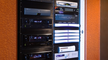 A view of home theatre system - A computer case, electronic device, electronics, personal computer, personal computer hardware, sound, stereophonic sound, system, technology, black, brown