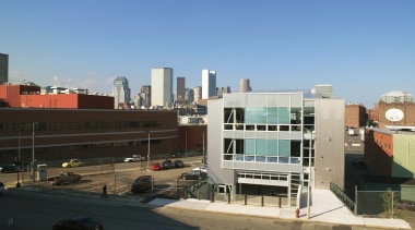 The new Artists For Humanity EpiCenter project in apartment, architecture, building, city, commercial building, condominium, corporate headquarters, daytime, downtown, facade, metropolitan area, mixed use, neighbourhood, real estate, residential area, roof, sky, urban area, teal, black