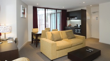 Quest rooms feature fully equipped Kitchenettes finished in apartment, ceiling, home, interior design, living room, property, real estate, room, suite, gray