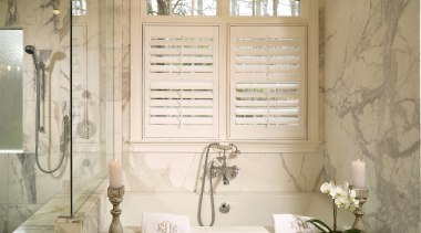 Enclosed within marble, the tub is an ideal bathroom, floor, home, interior design, plumbing fixture, room, tile, wall, window, brown, white