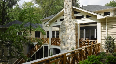 The owners of this home wanted to create cottage, home, house, outdoor structure, property, real estate, siding, tree, window, brown