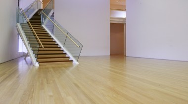 The new tauranga art gallery is located in daylighting, floor, flooring, hardwood, interior design, laminate flooring, room, wood, wood flooring, gray, orange