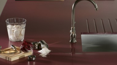 Other silestone surfaces include, Koan and Gedastu from floor, flooring, plumbing fixture, product design, sink, still life photography, table, tap, red