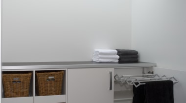 The cool, contemporary lines in this white laundry architecture, floor, glass, interior design, product design, room, shelf, shelving, wall, gray, white