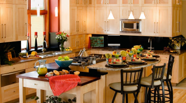 A view of these kitchens designed by Advance countertop, cuisine classique, interior design, kitchen, room, orange