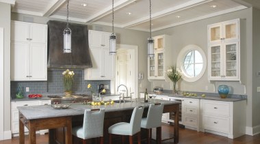 A view of this contemporary kitchen designed by cabinetry, ceiling, countertop, cuisine classique, dining room, interior design, kitchen, room, gray