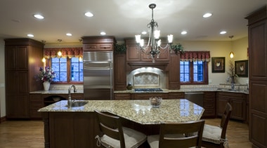 A view of this remodelled kitchen designed by cabinetry, ceiling, countertop, cuisine classique, dining room, estate, home, interior design, kitchen, room, gray, brown