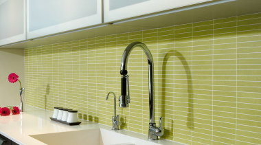 A view of the sleek kitchen  featturing countertop, interior design, kitchen, sink, gray