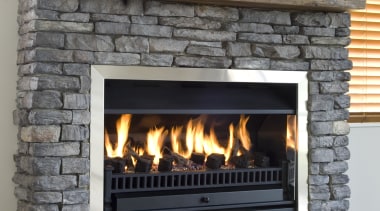 A view of a stone fireplace from Stutex fireplace, hearth, heat, masonry oven, wood burning stove, gray, black
