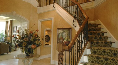 A view of some woodwork done by the baluster, ceiling, estate, floor, flooring, handrail, home, house, interior design, living room, lobby, property, real estate, stairs, brown