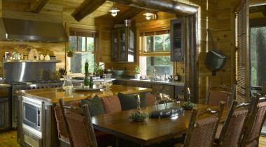 The kitchen is designed to be speedily accessed dining room, interior design, kitchen, real estate, room, table, brown