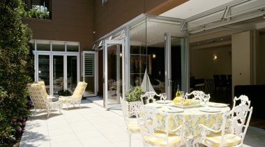 An interior an Exterior view of this home estate, home, house, interior design, outdoor structure, patio, real estate, window, brown, white