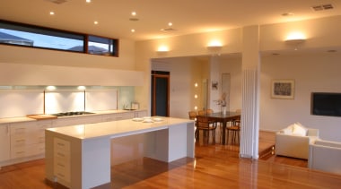 An interior view of the kitchen featuring stained ceiling, floor, flooring, hardwood, interior design, kitchen, lighting, property, real estate, room, table, wood flooring, brown, orange
