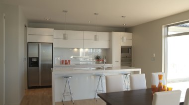 View of kitchen fitted with Smeg appliances. - countertop, floor, interior design, kitchen, property, real estate, room, gray, brown
