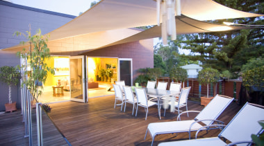 French doors lead directly from the main living backyard, canopy, deck, home, outdoor structure, patio, real estate, resort, roof, shade, white