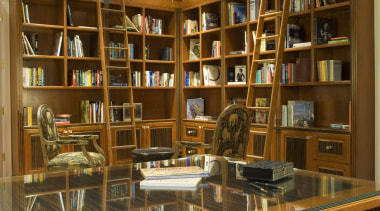 Custom Design Cabinets designed and fabricated the cabinets bookcase, bookselling, cabinetry, furniture, institution, library, library science, liquor store, public library, shelf, shelving, brown, orange