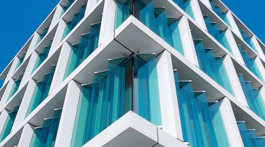 Colt Tolfab offers a range of sunshades and angle, architecture, blue, brutalist architecture, building, commercial building, condominium, corporate headquarters, daylighting, daytime, elevation, facade, headquarters, landmark, line, sky, skyscraper, structure, symmetry, tower block, teal, blue