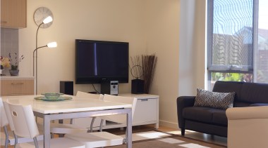 Jaleigh Blinds &amp; Curtains provide custom-made roller blinds chair, floor, flooring, furniture, hardwood, home, interior design, laminate flooring, living room, room, table, wall, wood, wood flooring, orange