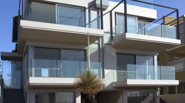 The design of these two adjacent apartments by apartment, architecture, building, commercial building, condominium, elevation, facade, home, house, mixed use, property, real estate, residential area, blue