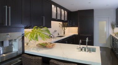View of a renovated kitchen and dining area countertop, interior design, kitchen, room, black, gray