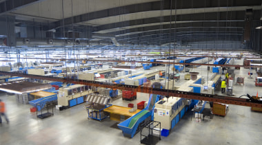 Staff process 1.5 million items of mail every aerospace engineering, factory, machine, manufacturing, gray, black