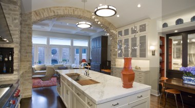 View of kitchen featuring wooden floor, cabinetry, marble ceiling, countertop, home, interior design, kitchen, living room, real estate, room, window, gray