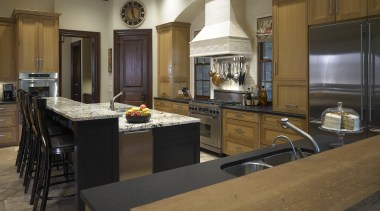 view of family kitchen which was designed by cabinetry, countertop, cuisine classique, flooring, interior design, kitchen, room, brown, black
