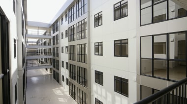 The main pool and beach resturant at Radisson apartment, architecture, building, facade, handrail, residential area, structure, window, gray, white