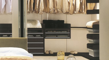 A view of a storage space designed by closet, furniture, interior design, wardrobe, gray