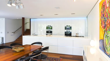 View of kitchen design by Linda Haefeli, and apartment, ceiling, home, interior design, kitchen, living room, real estate, room, table, white