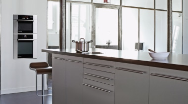 De Dietrich appliances have a sleek aesthetic that cabinetry, countertop, furniture, interior design, kitchen, gray, white