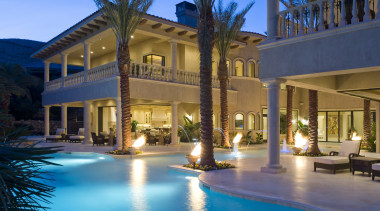 View of a home built by Domanico Custom arecales, condominium, estate, hacienda, home, hotel, house, leisure, lighting, mansion, mixed use, palm tree, property, real estate, reflection, resort, resort town, swimming pool, villa, blue