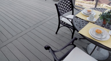 View of products from WeatherBest Decking &amp; Railing. chair, deck, floor, furniture, outdoor furniture, outdoor structure, sunlounger, table, wood, gray