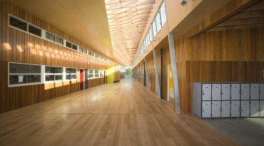 View of Williamstown High School in Melbourne. Designed architecture, ceiling, daylighting, floor, flooring, hardwood, interior design, laminate flooring, lobby, structure, wood, wood flooring, brown