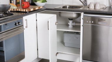 View of waste water pump by Saniflo - countertop, furniture, home appliance, kitchen, kitchen appliance, kitchen stove, major appliance, product, product design, refrigerator, gray