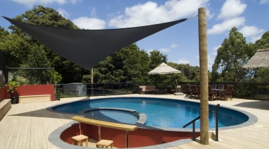 view of a pool built by Mayfair Pools. estate, leisure, outdoor furniture, outdoor structure, property, real estate, resort, shade, sunlounger, swimming pool, villa