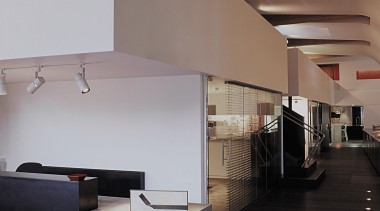 Cut-outs in the wall ensure the studio can architecture, ceiling, daylighting, floor, flooring, furniture, interior design, product design, wood, black, gray