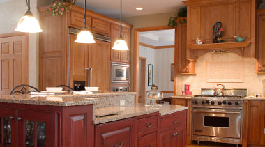 Finage cabinetry kitchen, with countertops, kitchen appliances. cabinetry, countertop, cuisine classique, floor, flooring, furniture, hardwood, home, interior design, kitchen, room, wood, wood flooring, brown