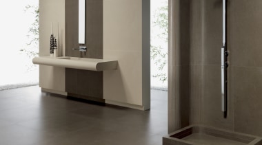 Contemporary shower and basin inside Italian style villa bathroom, bathroom accessory, bathroom cabinet, floor, flooring, plumbing fixture, product design, tap, tile, gray, black