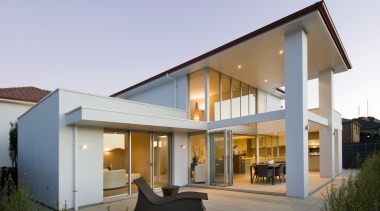 Contemporary home with entry through a raised portico architecture, elevation, estate, facade, home, house, property, real estate, residential area, villa, window, gray