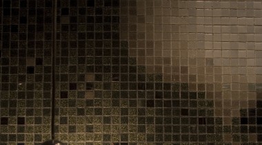 View of a powder room which features a ceiling, floor, flooring, light, light fixture, lighting, tile, wall, brown, black