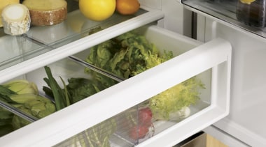 Interiors include crisper drawers with an improved glide countertop, furniture, kitchen, produce, refrigerator, shelf, shelving, table, white