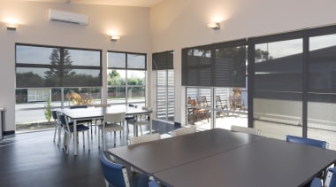 Image of student building designed by Design 89 interior design, real estate, window, gray