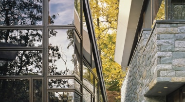 With its layered roofs and interconnected volumes, this architecture, building, facade, home, house, residential area, window, gray, black