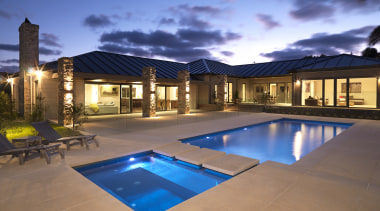 View of outdoor area, pool and spa which estate, home, house, leisure, lighting, property, real estate, reflection, resort, sky, swimming pool, villa, blue