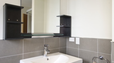 Bathroom Direct provided the turnkey renovation for this bathroom, bathroom accessory, bathroom cabinet, countertop, interior design, kitchen, property, real estate, room, sink, gray