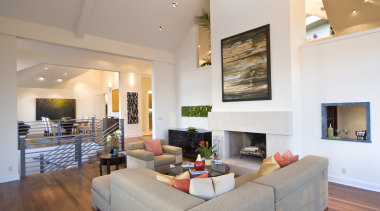 Volumes in the home, such as this main ceiling, estate, floor, flooring, hardwood, hearth, home, house, interior design, interior designer, living room, penthouse apartment, property, real estate, room, wall, wood flooring, gray